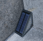 StairMod weatherproof solar LED step lights installed on outdoor paved stairs
